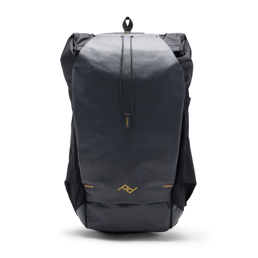 A brown Peak Design Outdoor Backpack 25L with a visible brand logo on the lower side. black
