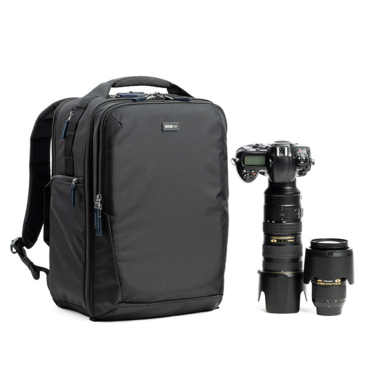 Dark gray commuter backpack with front zip pocket and padded shoulder straps