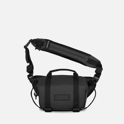 Black shoulder bag with visible brand logo on a white background