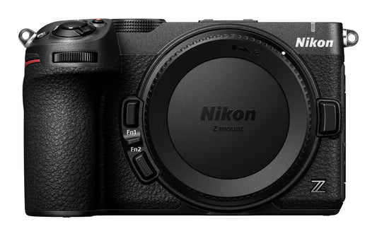 A Nikon mirrorless camera body in black, shown from the front with the lens removed and a Nikon Z-mount lens cap installed. The Nikon logo is visible on the top right and on the lens cap.