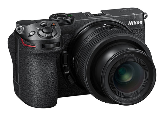 A Nikon mirrorless camera with a zoom lens, shown from a three-quarters angle on a solid white background.