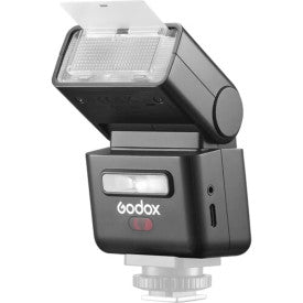 Godox iT32 TTL mini flash with open diffuser panel and black compact body
